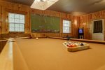 Game Room with Pool Table, Movie Projector, and Vintage Arcade Games